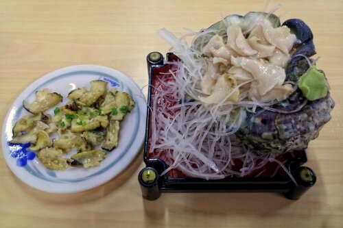 Okinawan yakogai shell fried and raw as sashimi Okinawan yakogai shell fried and raw as sashimi