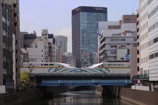 Shinkansen MAX over Kanda River